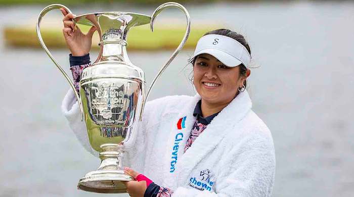 Lilia Vu holds the Dinah Shore trophy after winning the 2023 Chevron Championship.